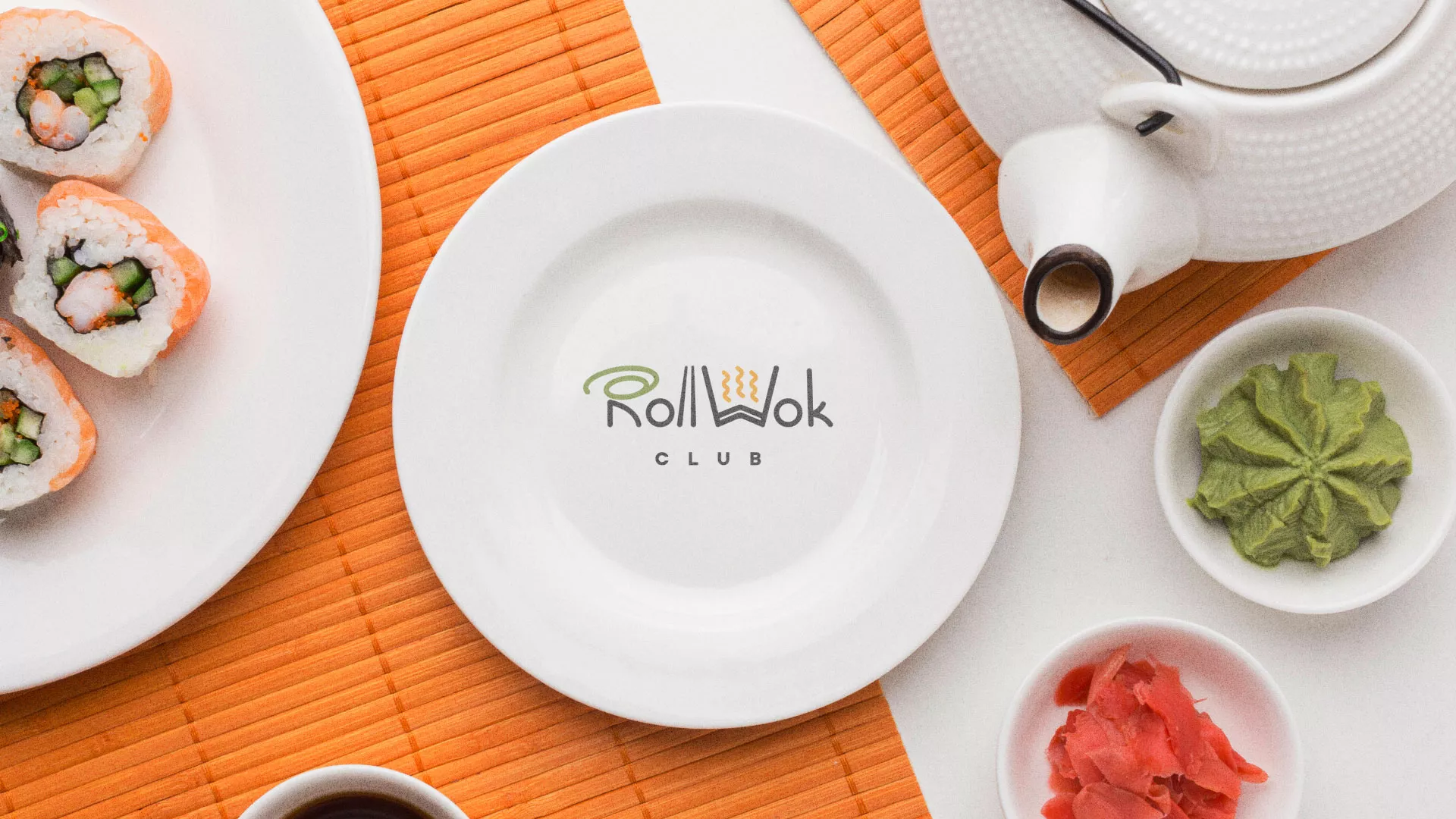 Разработка логотипа и фирменного стиля суши-бара «Roll Wok Club» в Таштаголе